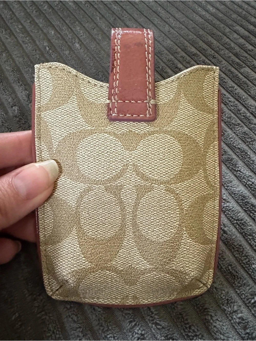Coach phone sleeve