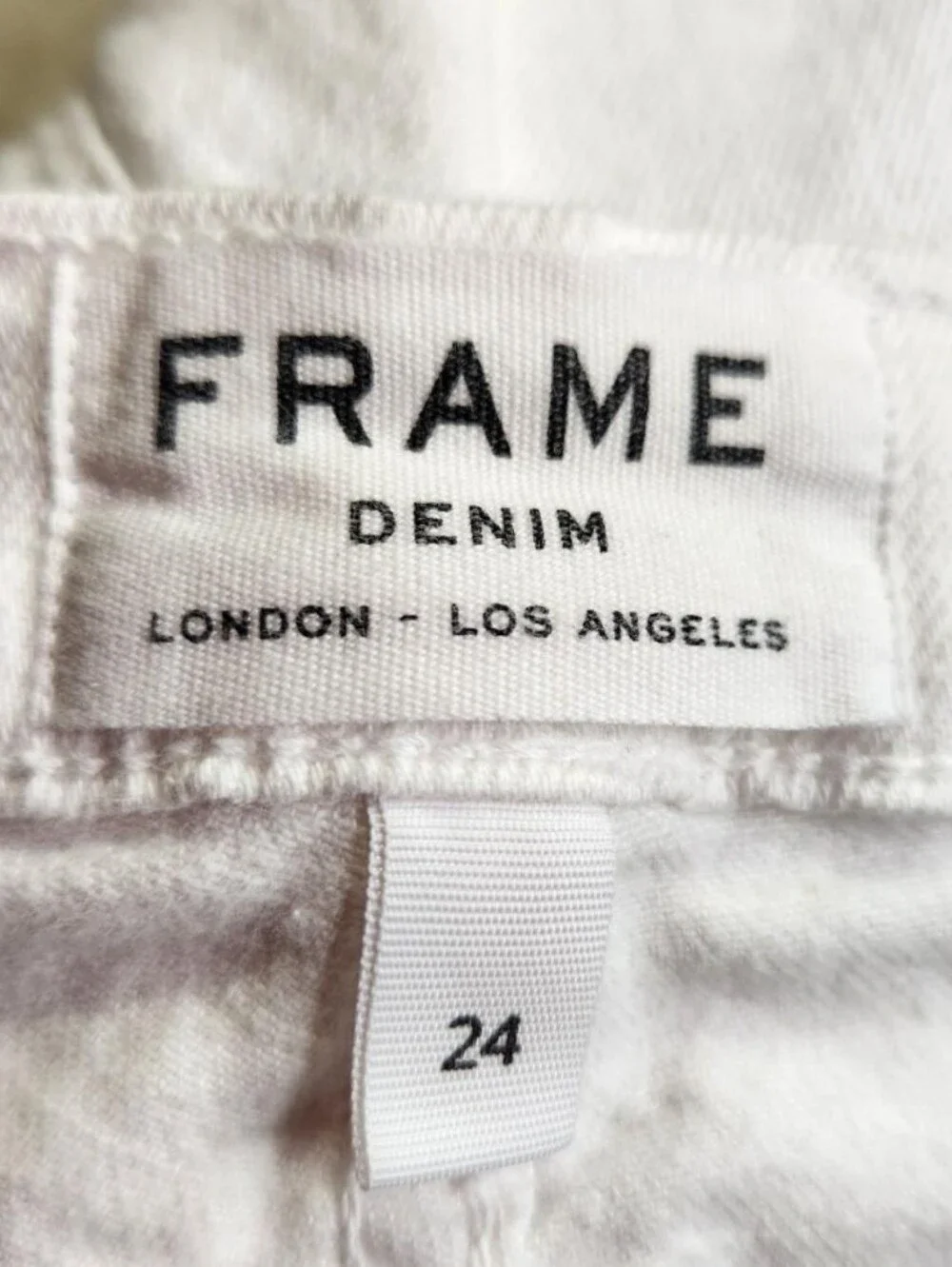 Frame Denim stains premium up