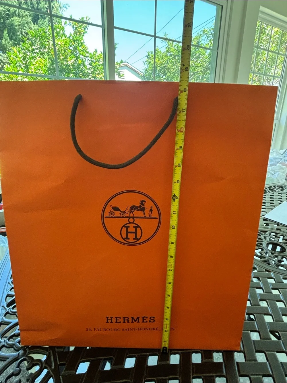 Hermes Orange Shopping Bag with Black Rope Handles