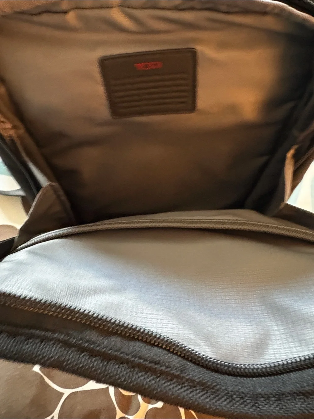 Tumi compact messenger