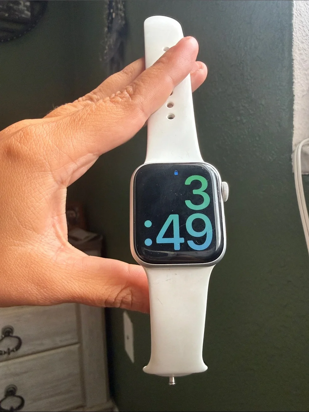 Apple Watch with White Sport Band and Lavender Charging Holder
