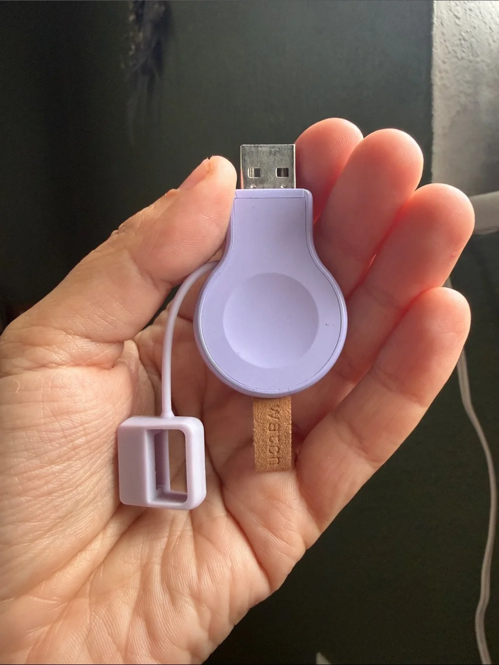 Apple Watch with White Sport Band and Lavender Charging Holder