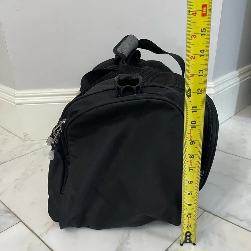 Calpak black canvas multi-pocket dual strap duffel bag travel luggage gym