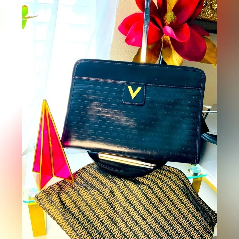 VGT Mario Valentino authentic. Black classy clutch/purse Gold Detail “Host Pick”