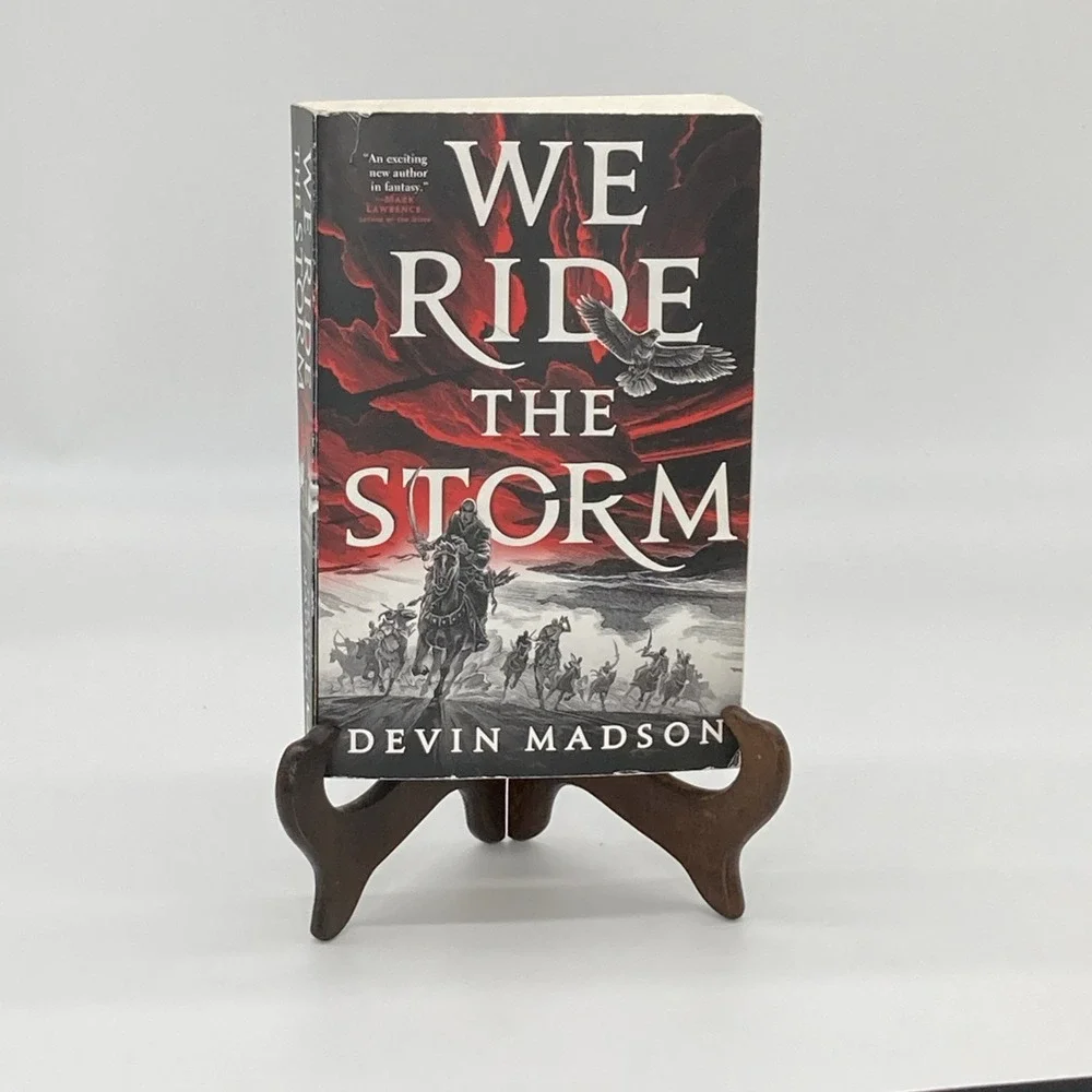 We Ride the Storm: The Reborn Empire #1 by Devin Madson paperback, Fantasy novel