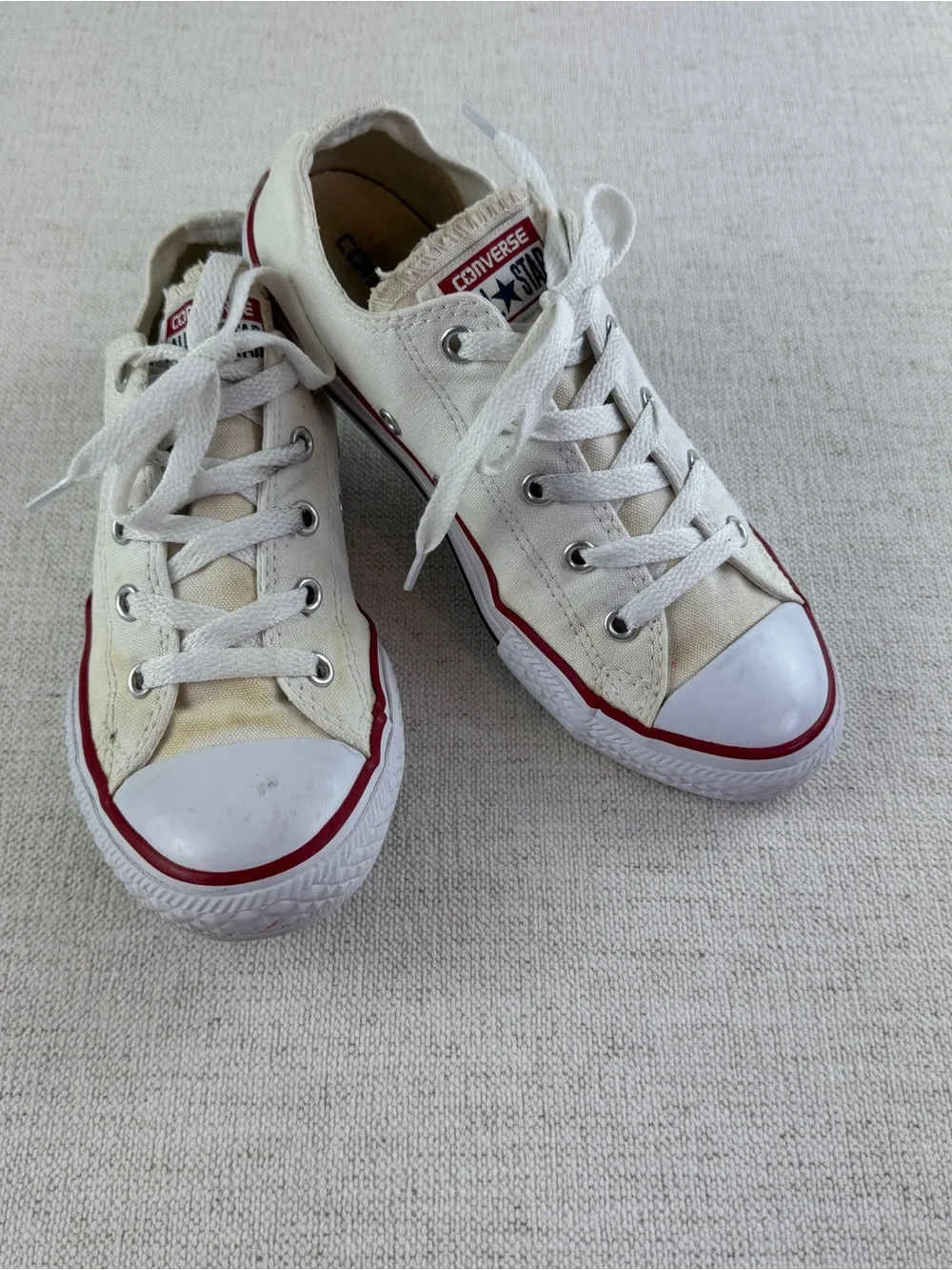 Converse youth size 3 Low Top Canvas Sneakers in Off-White with Red Trim