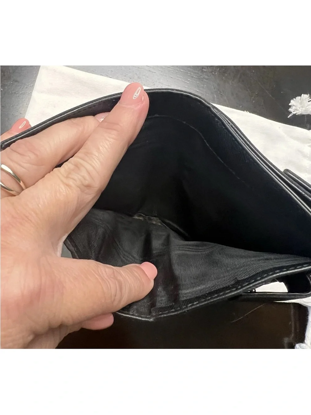Prada wallet prominent