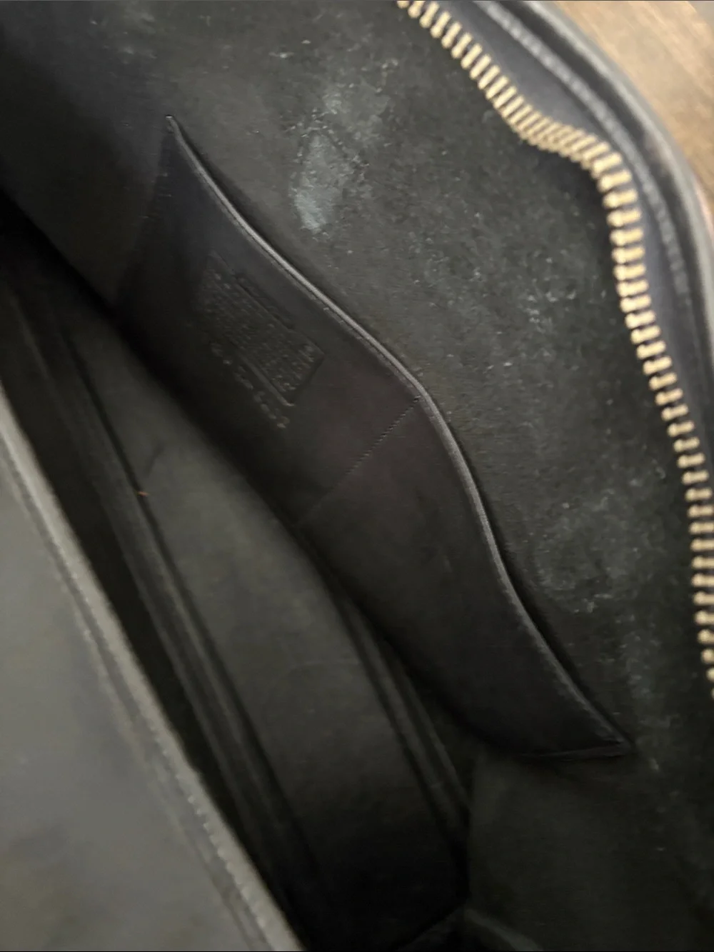 Coach sleek black