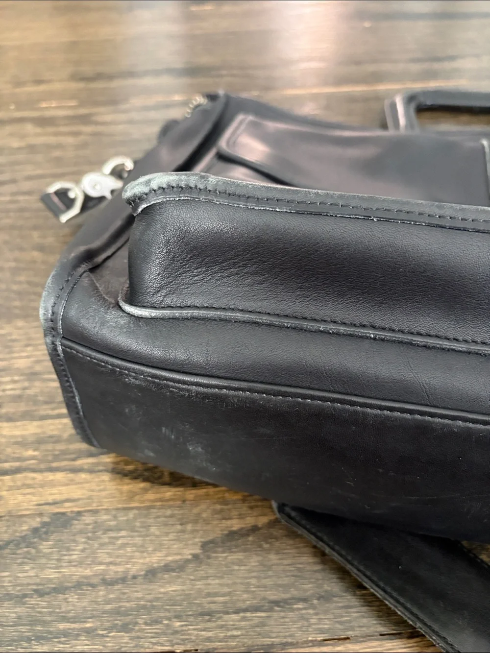 Coach sleek black