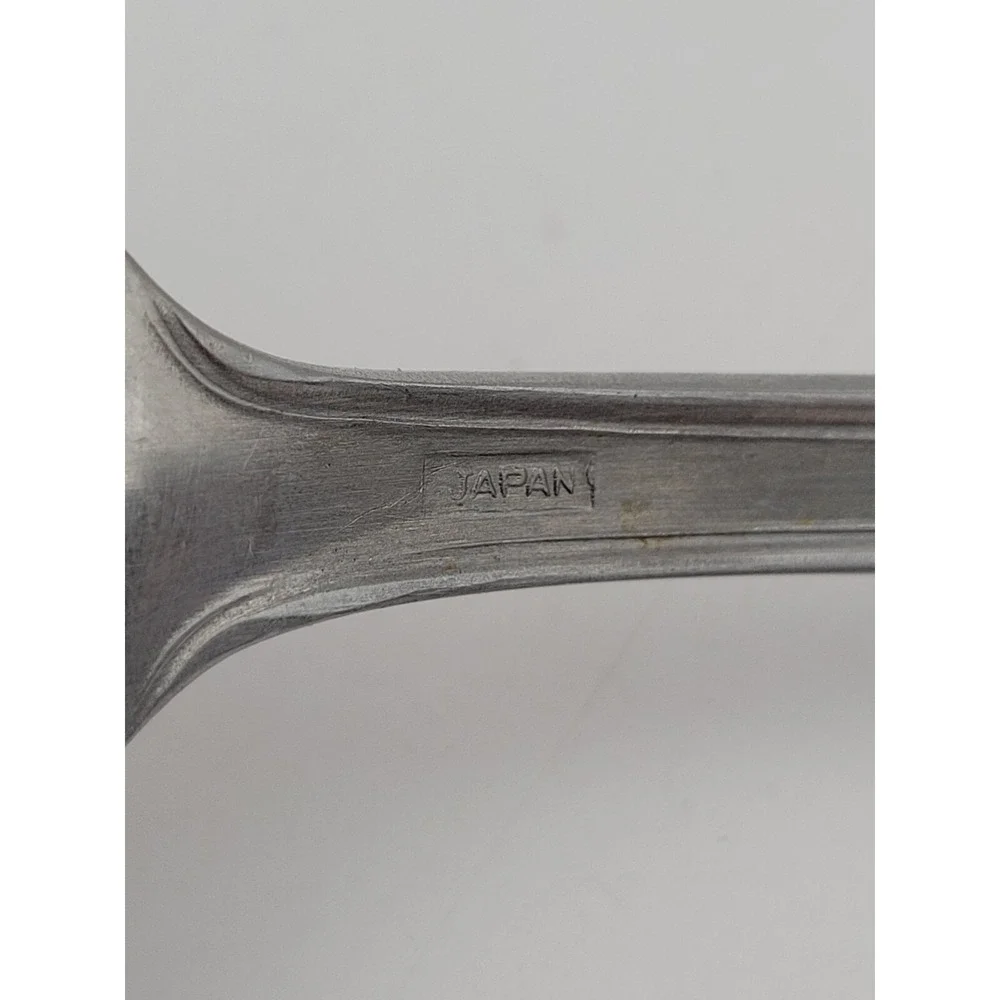 Reed & Barton serving colonial measure
