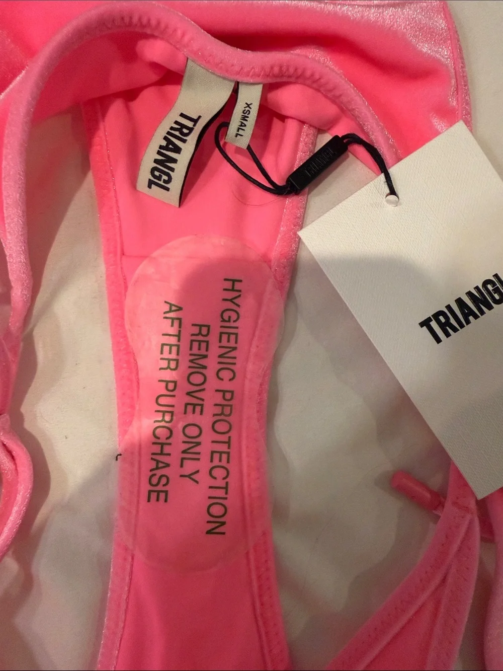 triangl swimwear tags was but