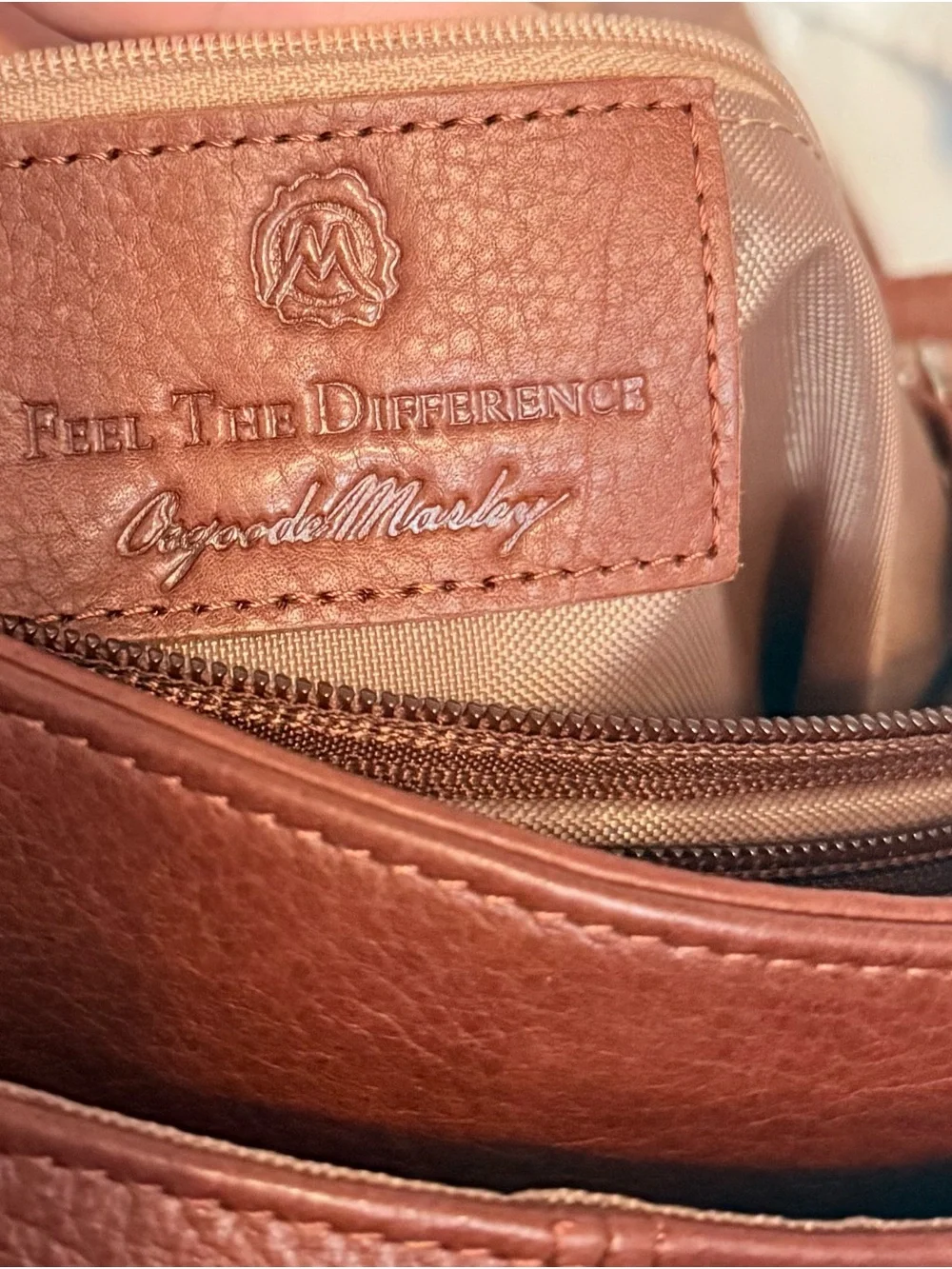 Osgoode Marley sleek leather