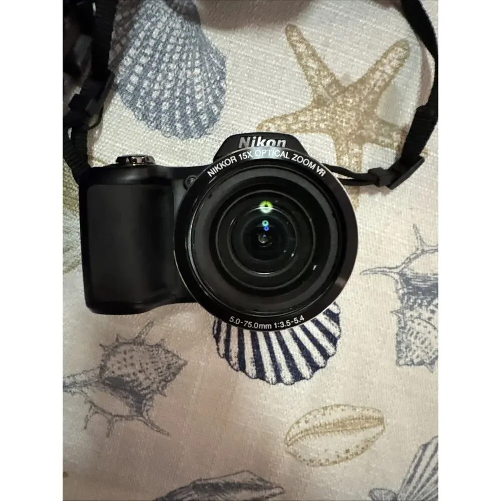 Nikon Black Camera with Matching Black Carry Case and Red Trim