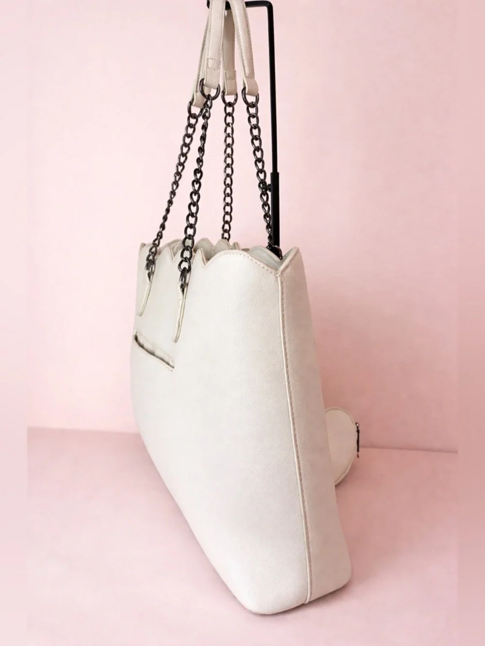 Betsey Johnson cream-colored tote bag black chain straps and heart-shaped charm