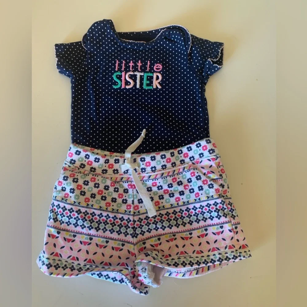 Carter’s bundle of 4 infant girl clothing