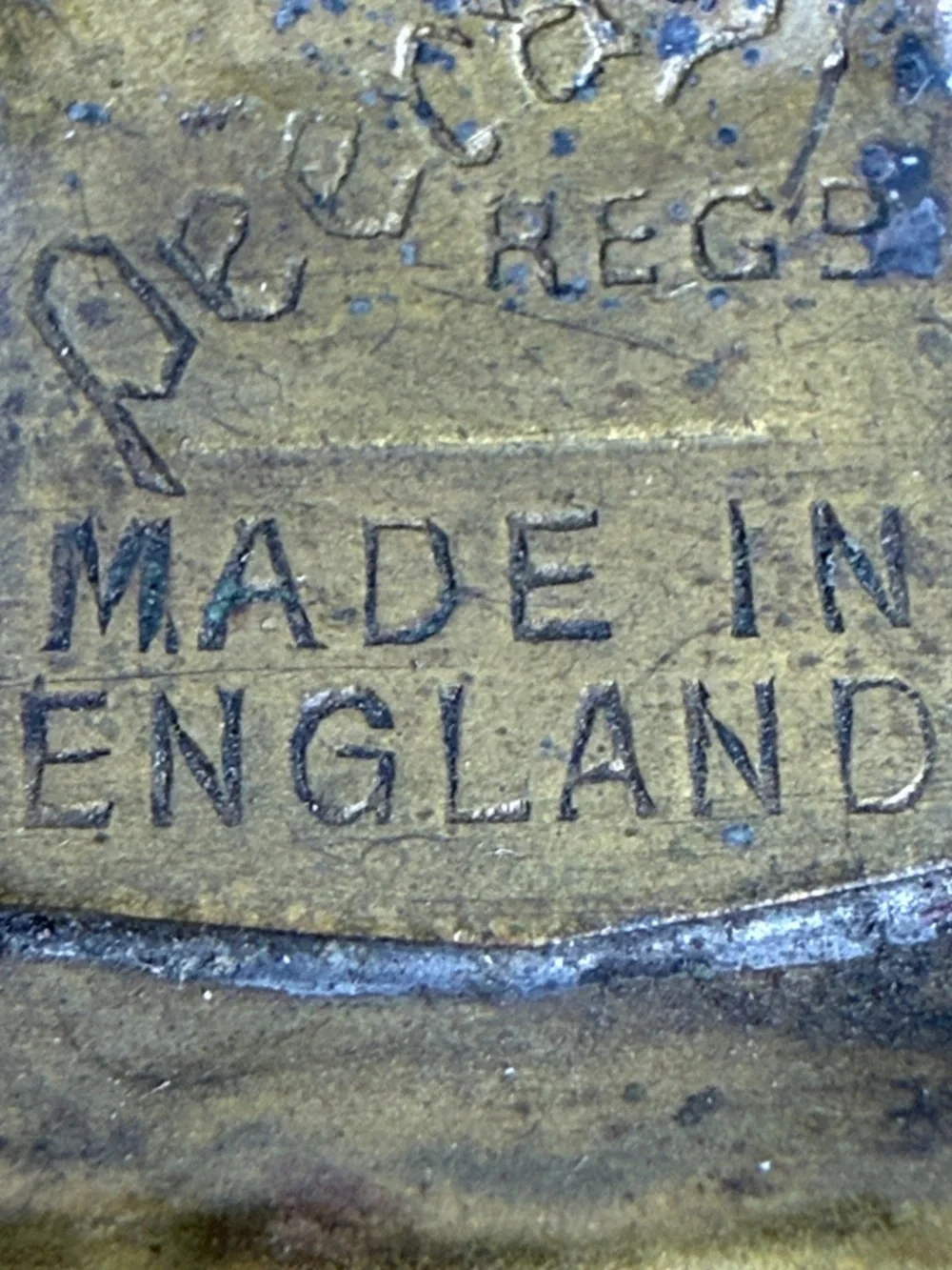 Decorative Embossed Brass Wall Plate with Spinning Wheel Motif