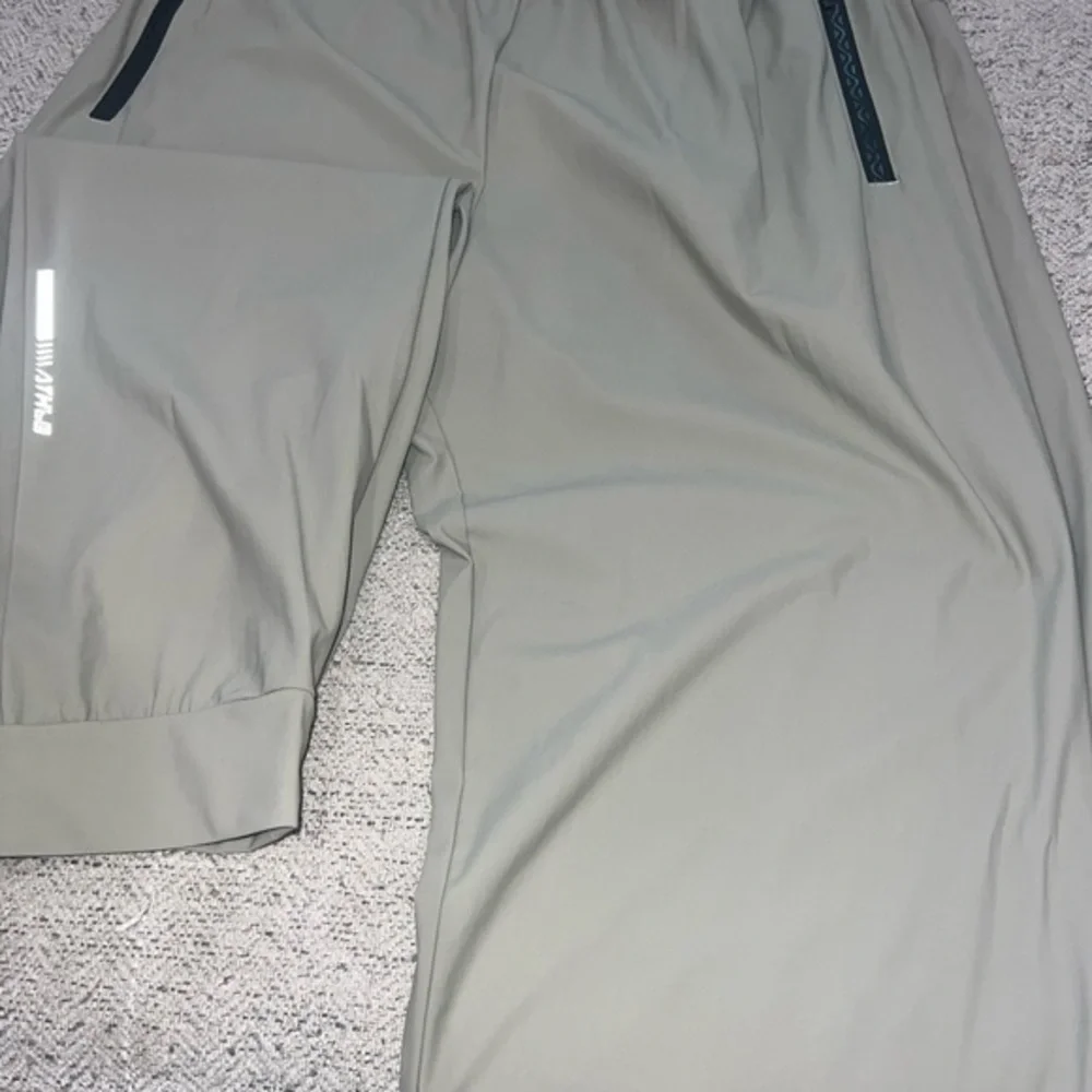 Beige Athletic Joggers with Black Accents