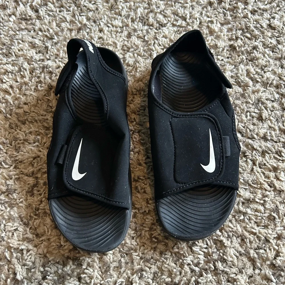 Nike Kids Black Slide Sandals with White Swoosh Accent