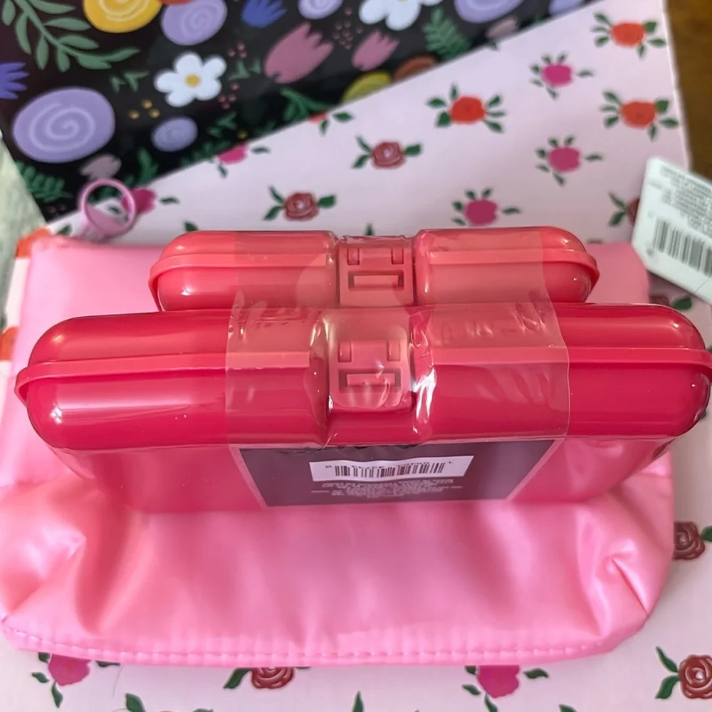 Two Small size cosmetic cases plus free zipper bag