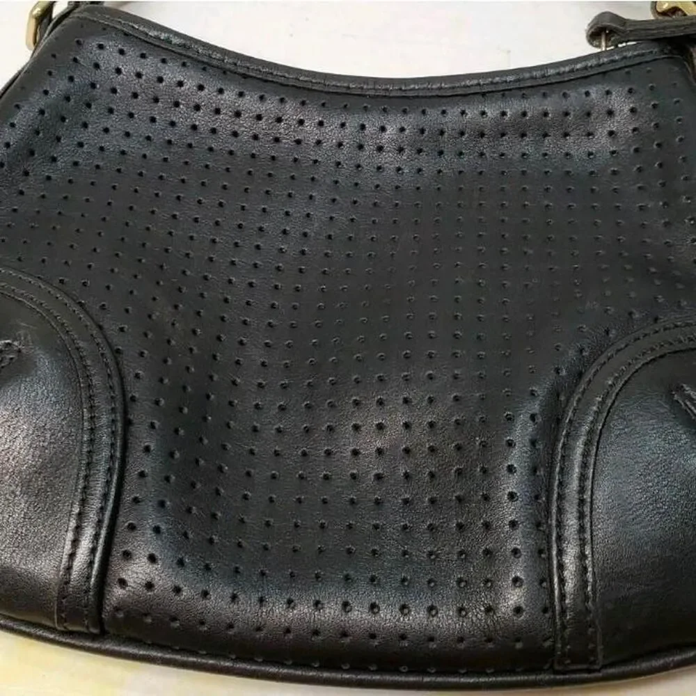 Coach black perforated