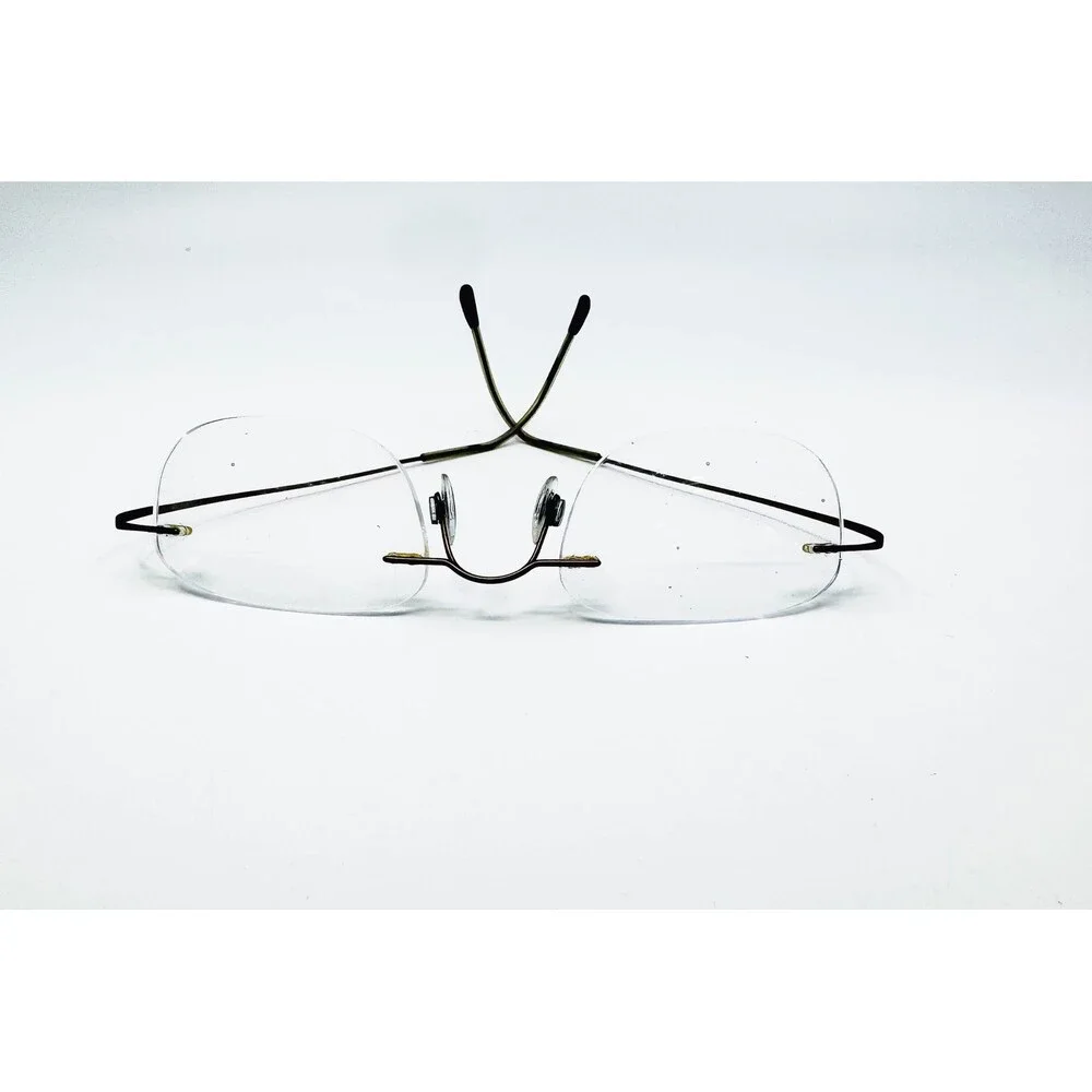 Silhouette Eyeglasses Unisex Brown Rimless Titanium Frame 51-17 140