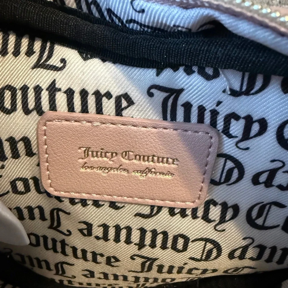 Juicy Couture includes strap