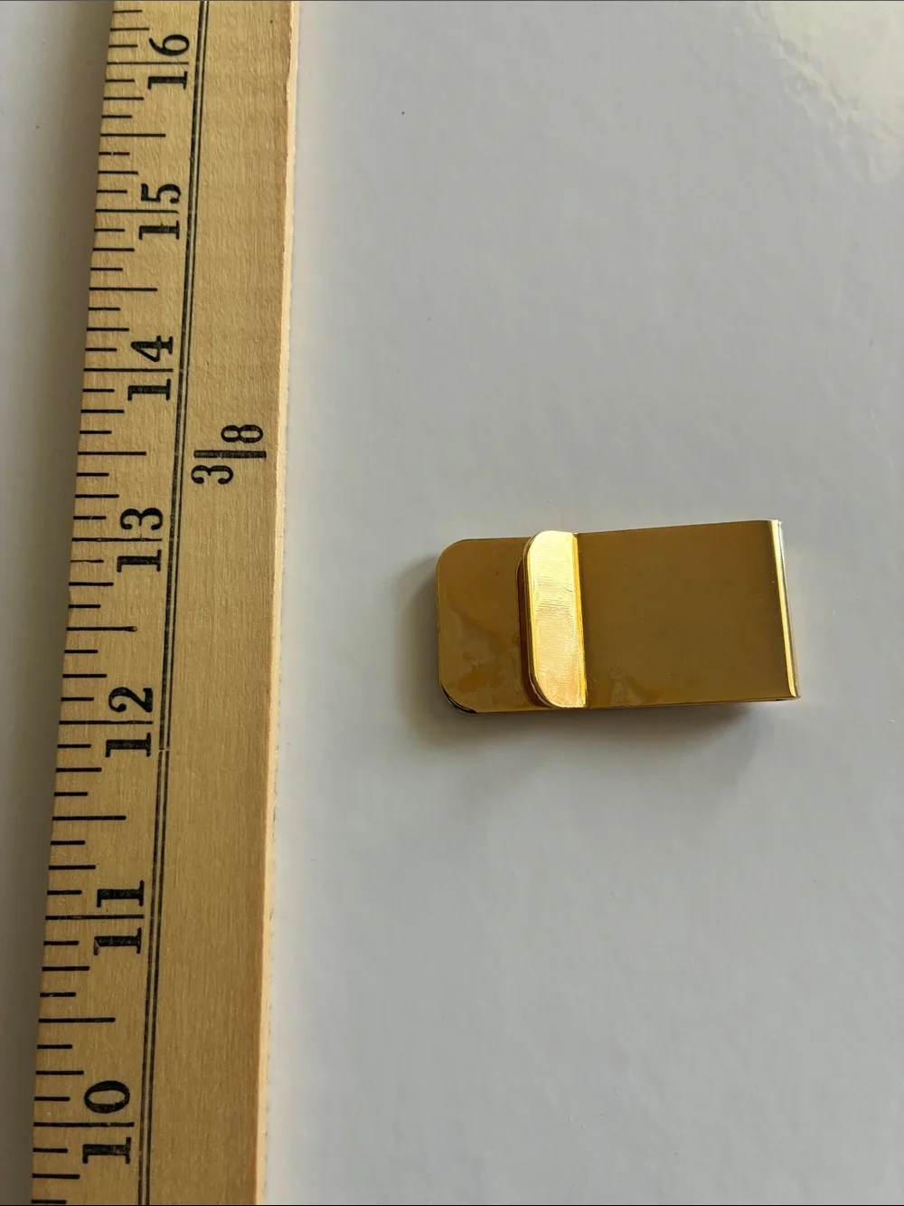 Source Unknown sleek gold