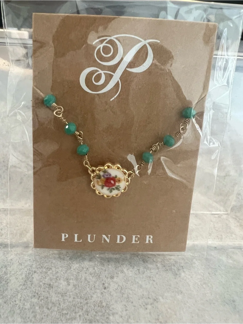 Plunder gold tone
