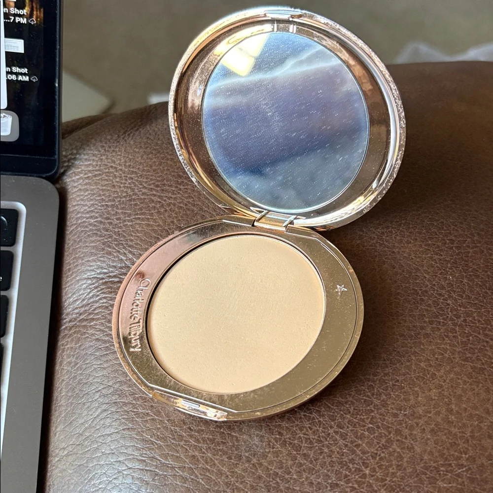 Charlotte Tilbury polished gold