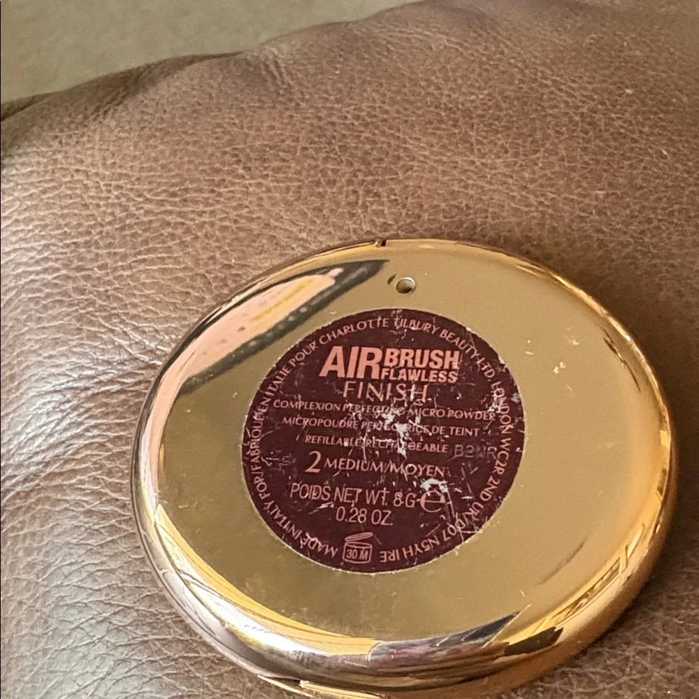 Charlotte Tilbury polished gold