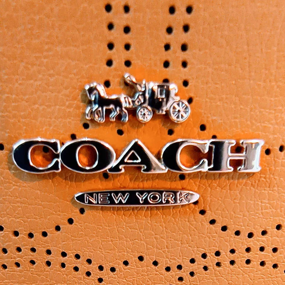 Coach wristlet tan