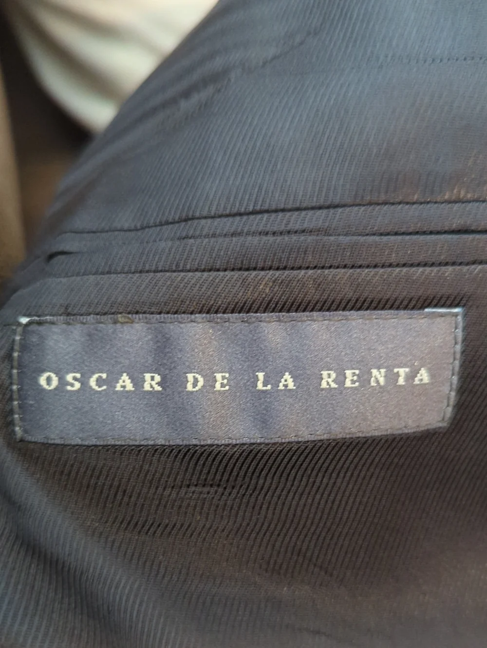 Oscar de la Renta designer gray