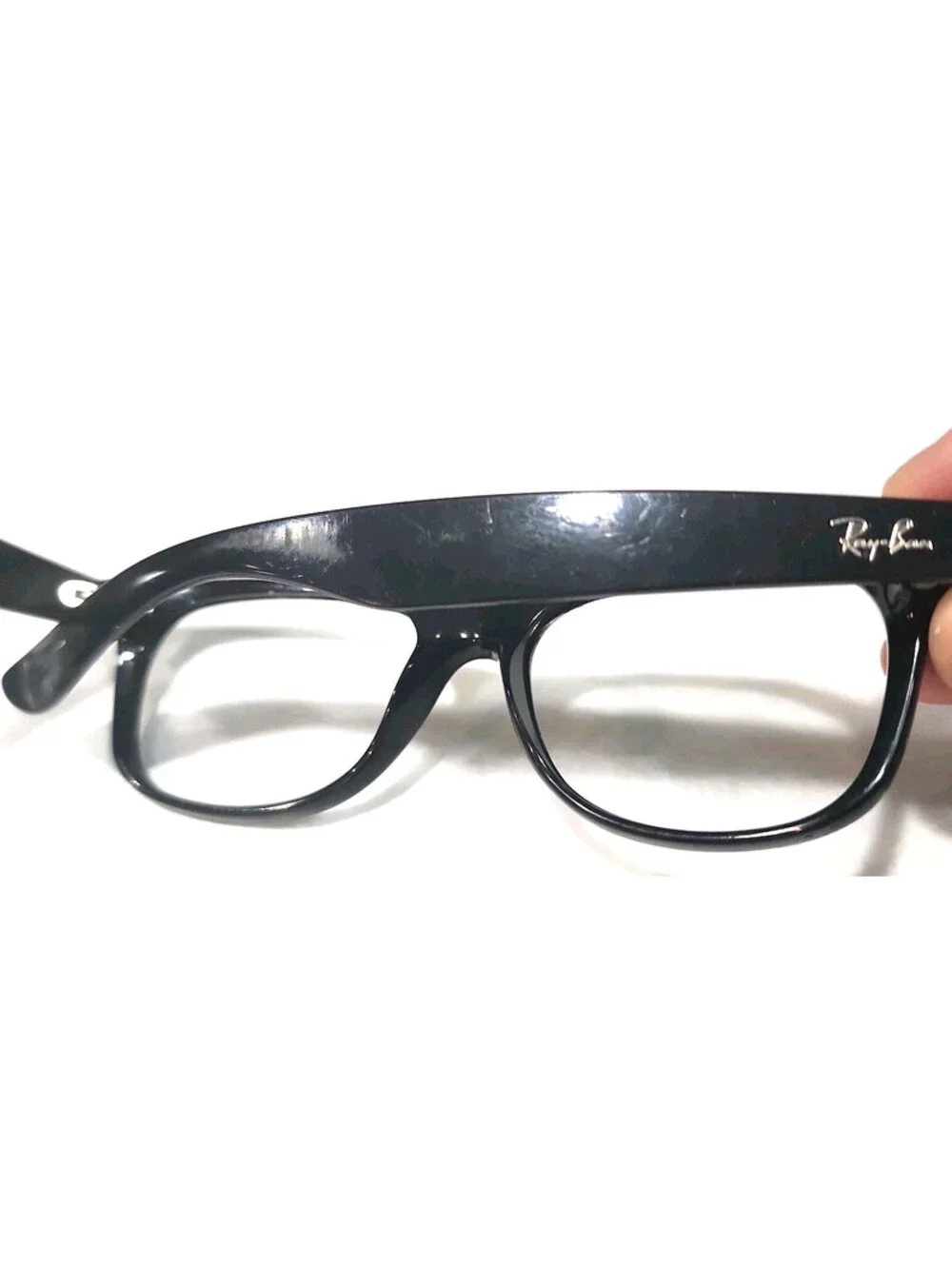Ray-Ban scratches on 