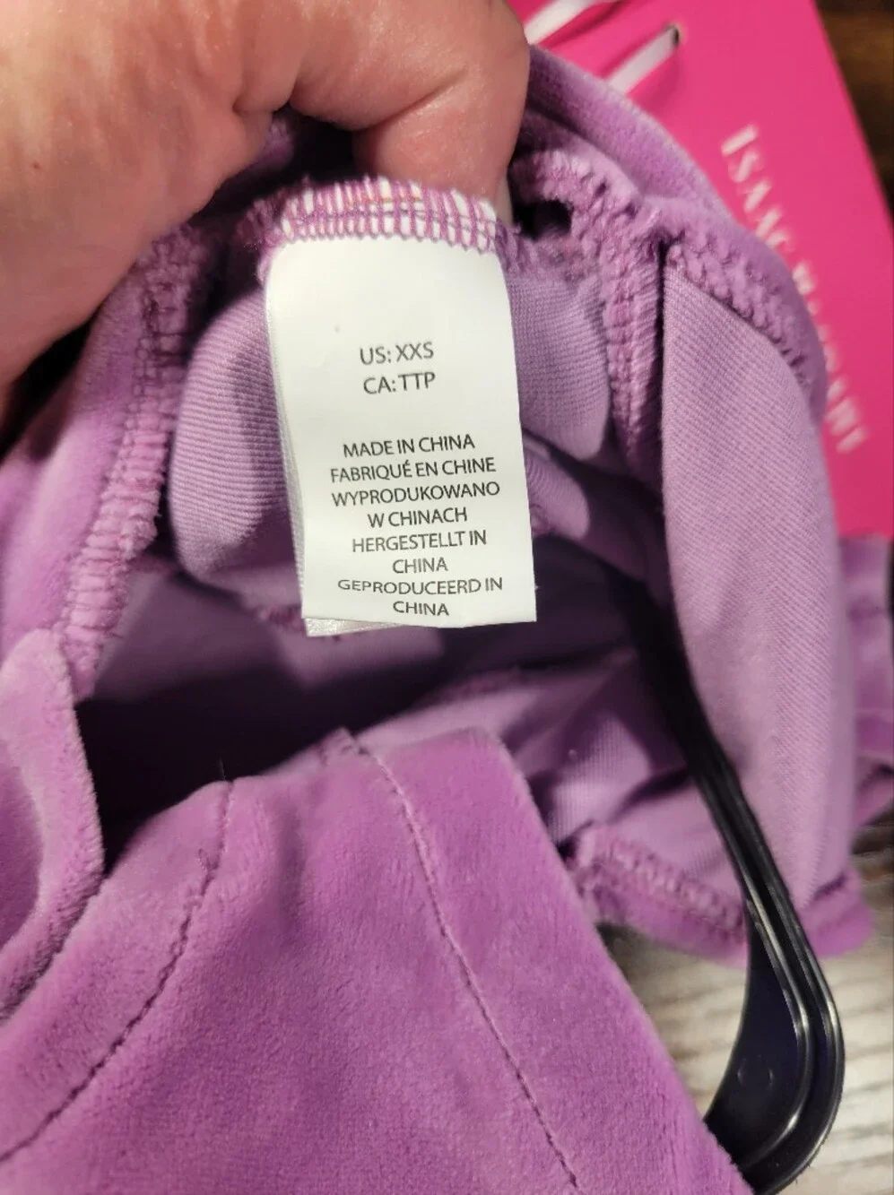 Isaac Mizrahi attached tag