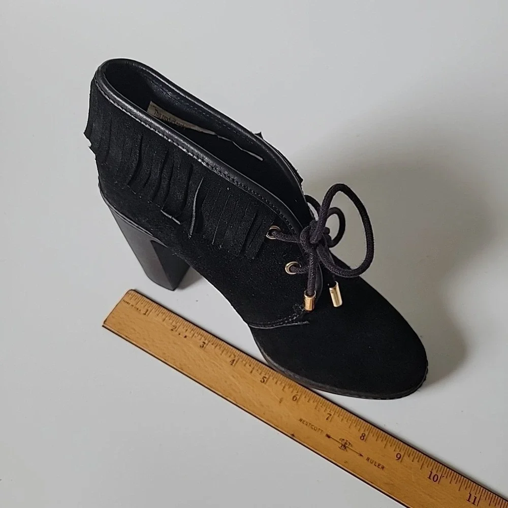 Tory Burch features black