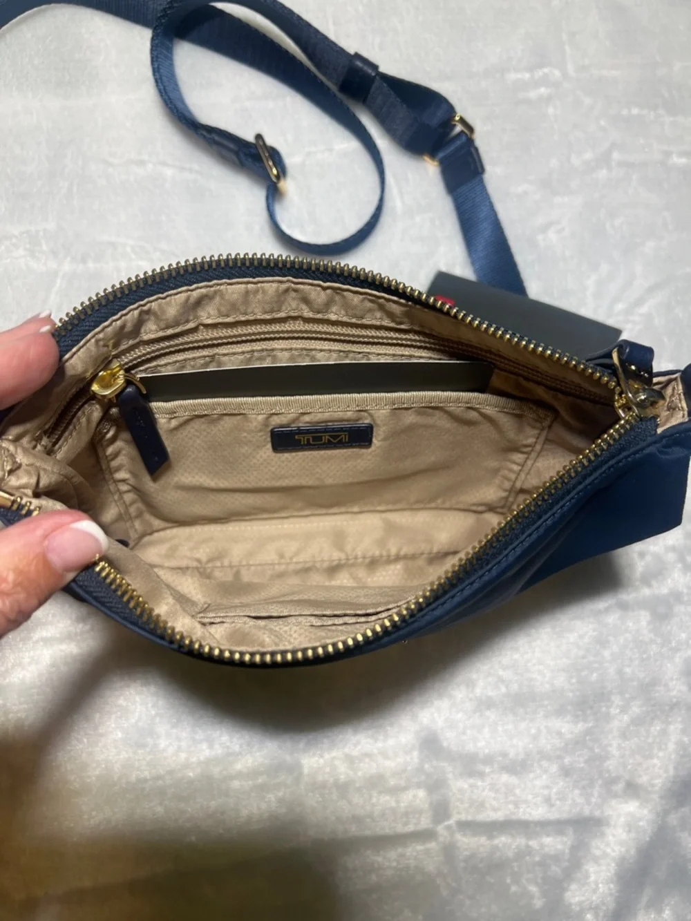 Tumi compact crossbody
