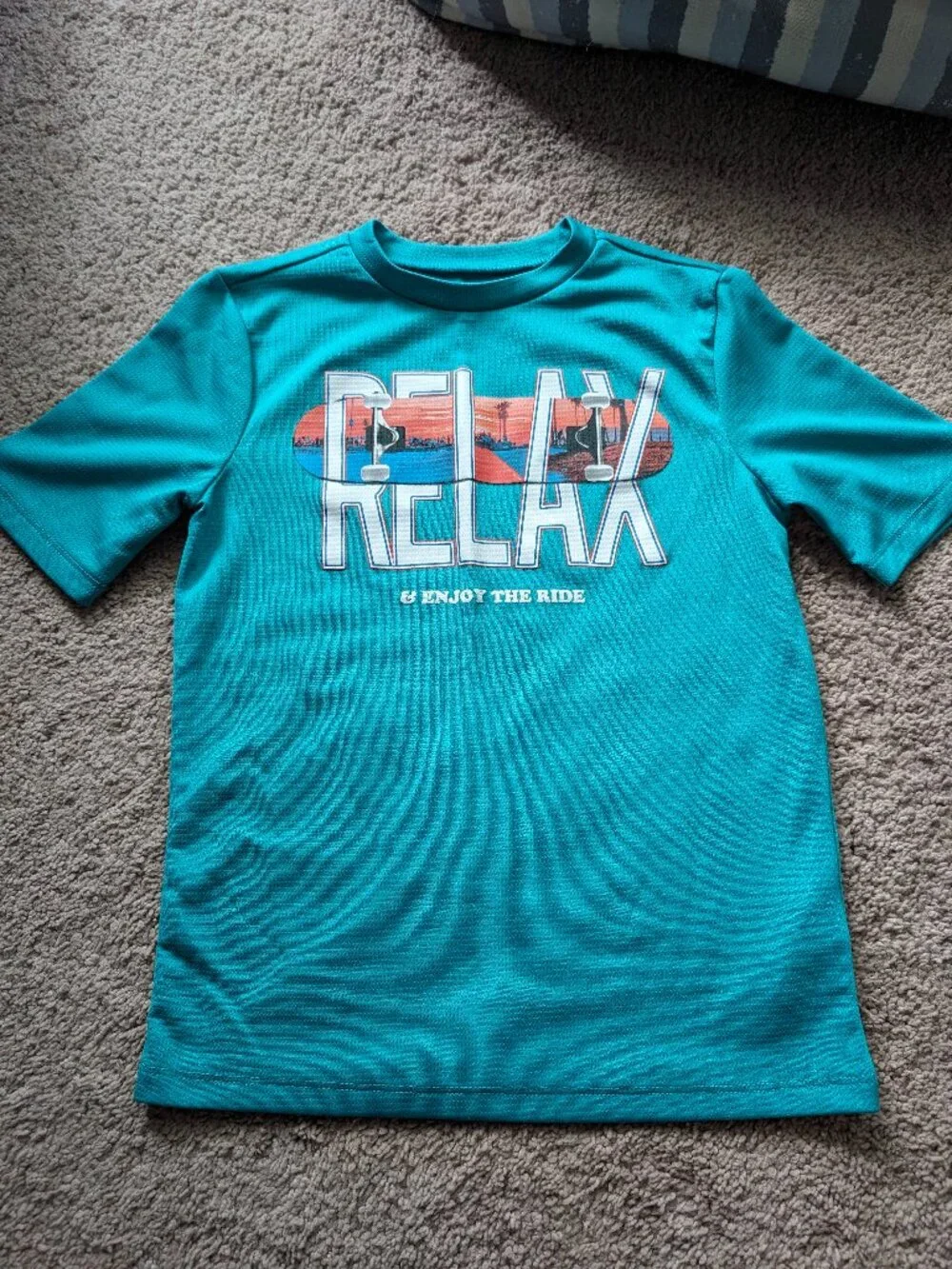 ON teal rashguard/swim top (YM)