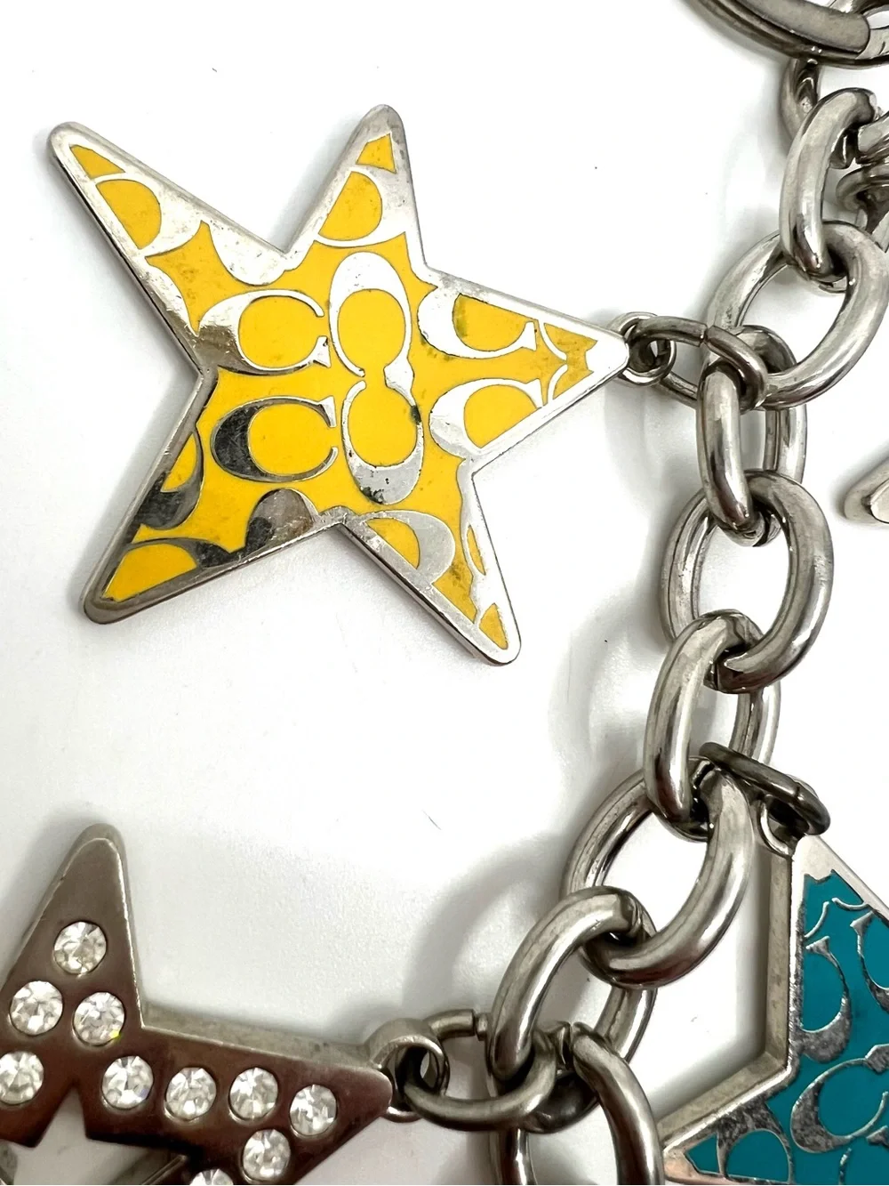Coach star dangle