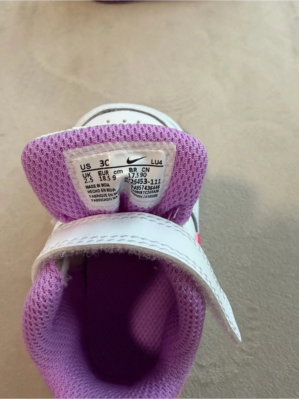 Nike Toddler White Sneakers with Pink & Purple Accents