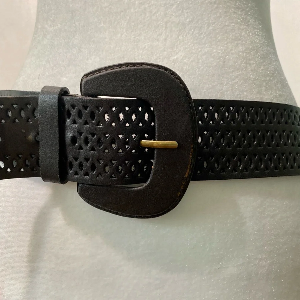 Chico’s dark brown leather belt.Size M/L is 42” long