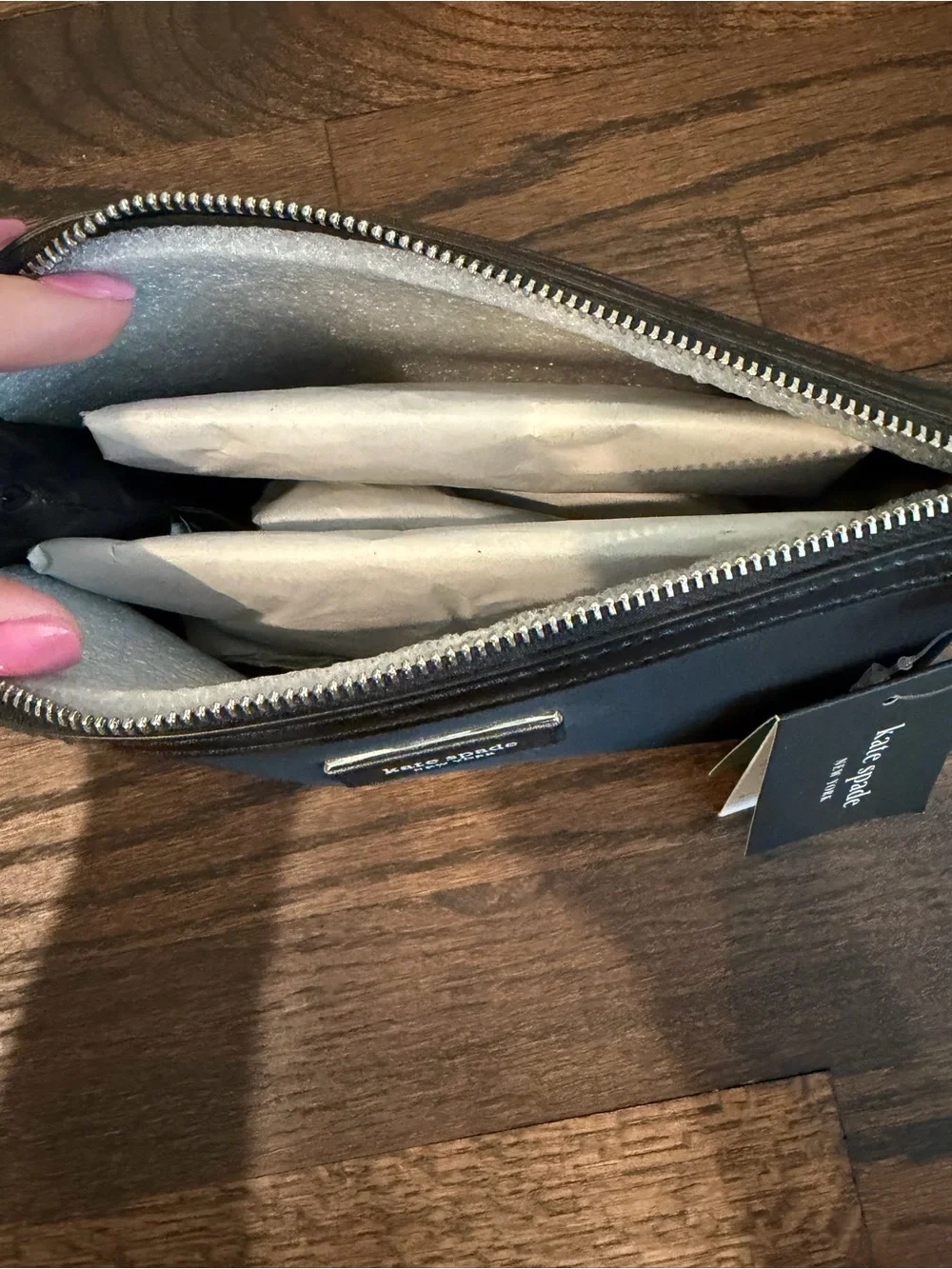 kate spade black toiletry pouch with zip-top