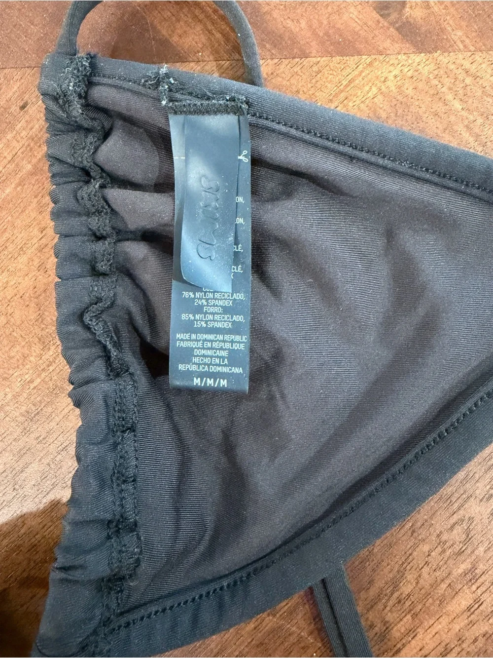 SKIMS black triangle