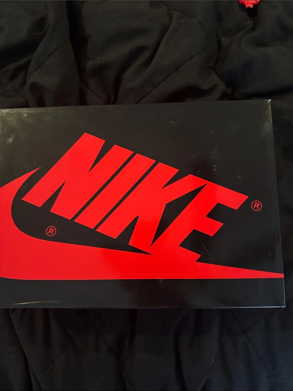 Nike Black Box with Bold Red Swoosh