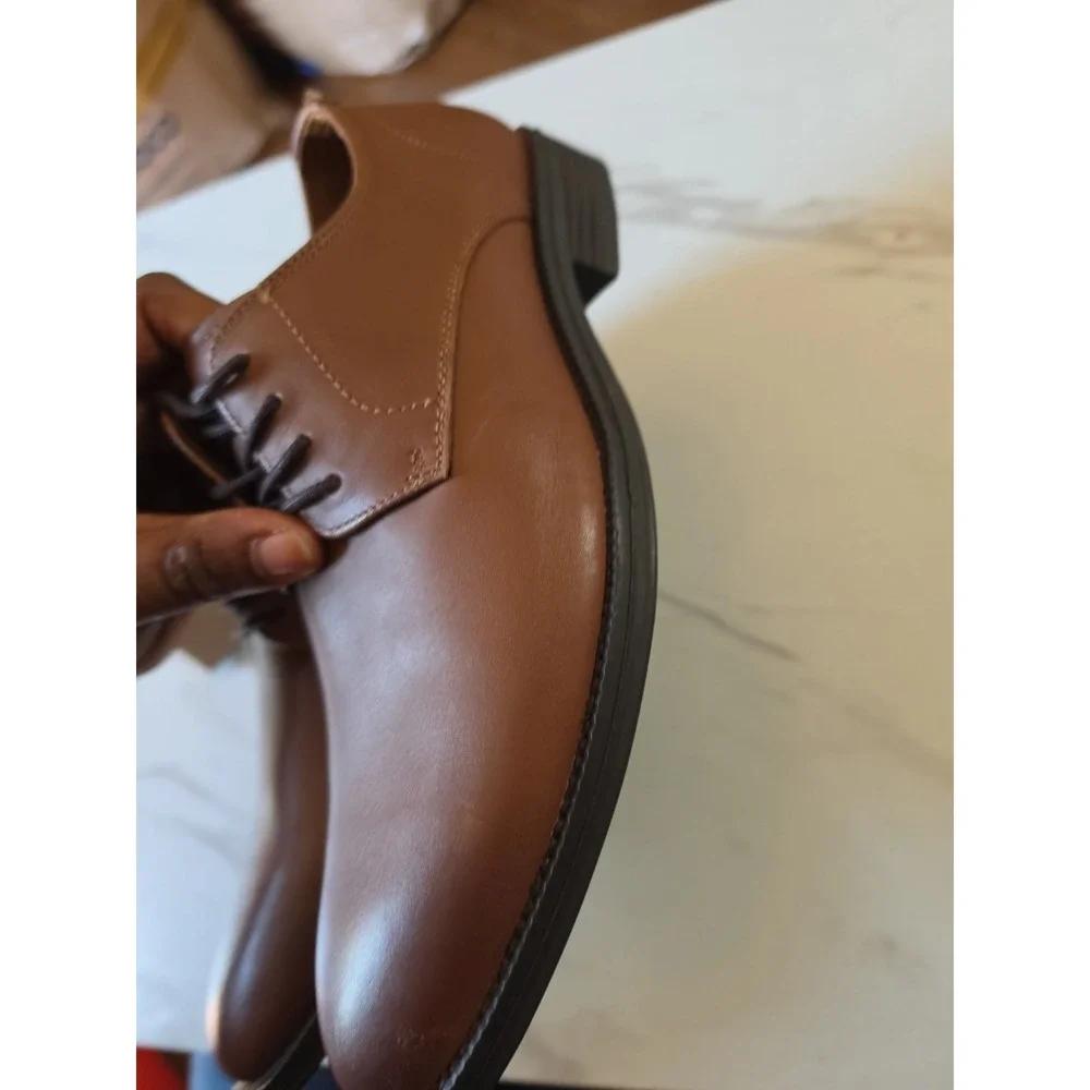 Calvin Klein tan leather usps