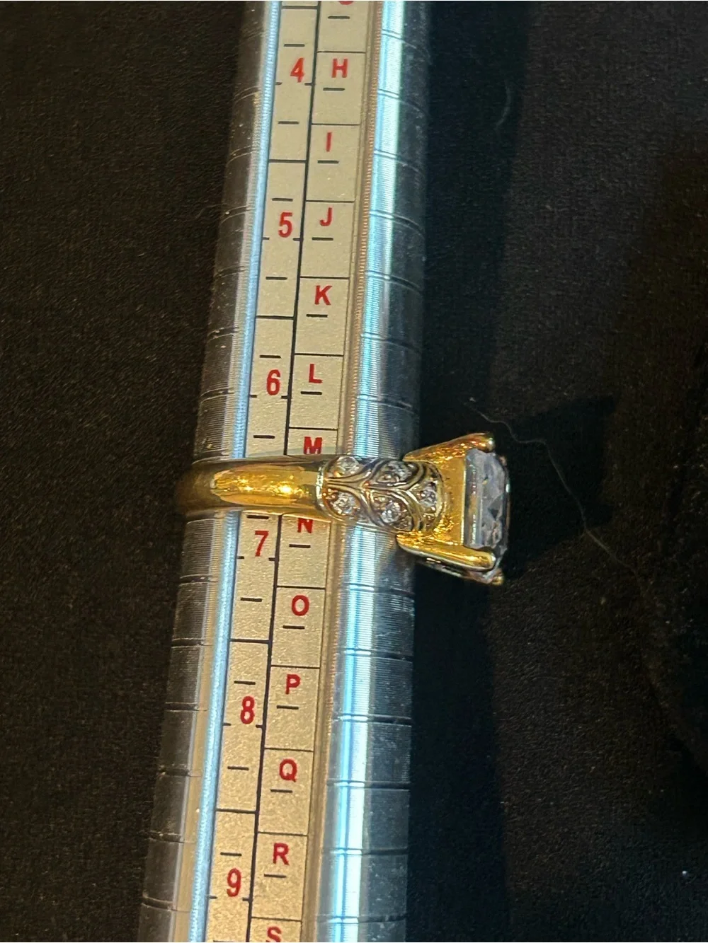 Gold Tone Clear Square Solitaire Ring with Accent Stones