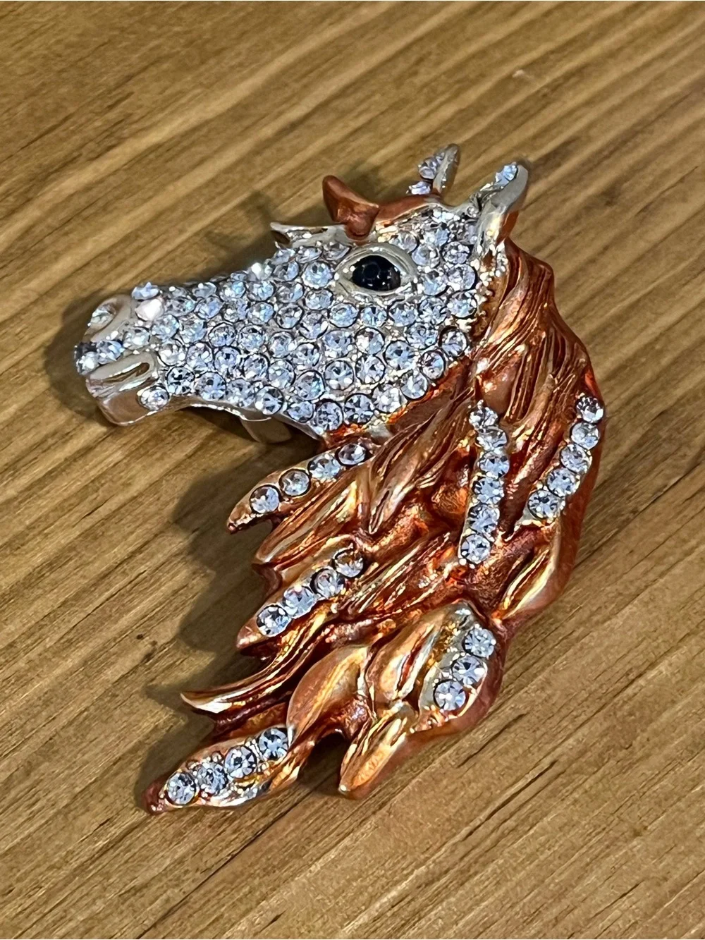 None this brooch