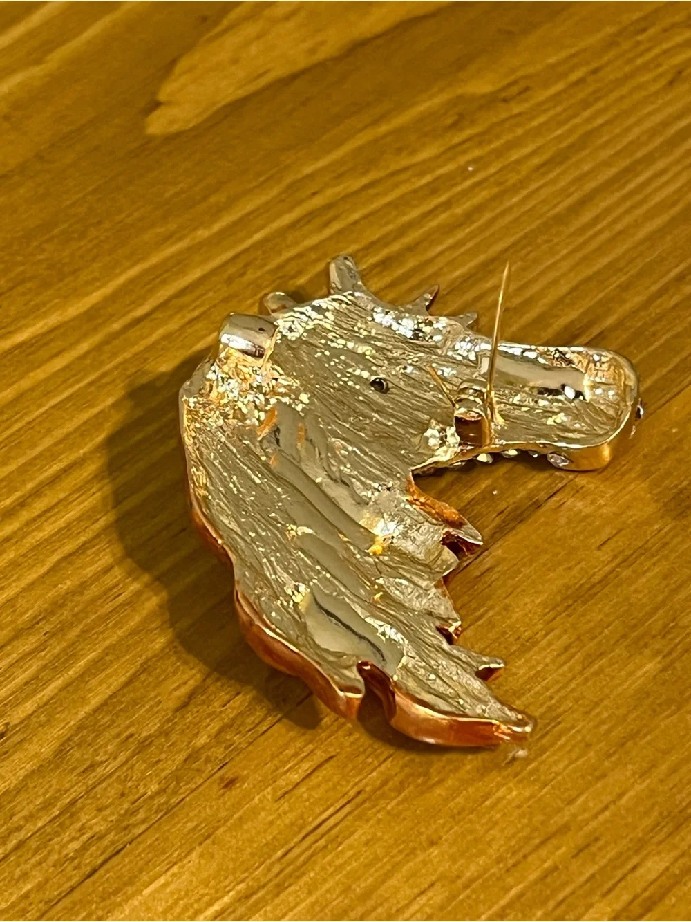 None this brooch
