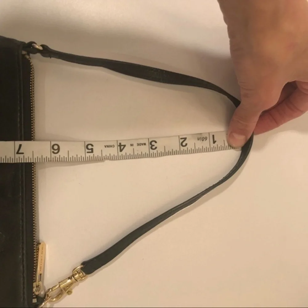 Michael Kors scratches hardware marks