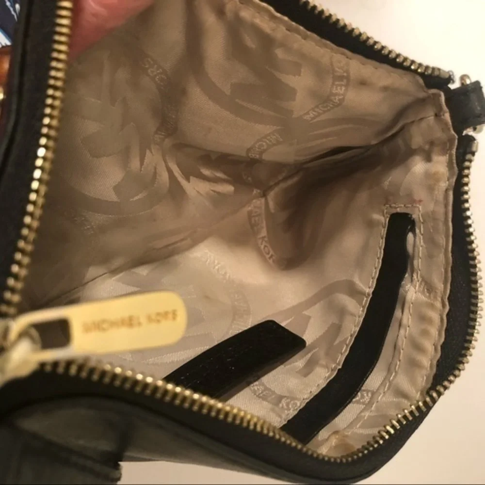 Michael Kors hardware scratches wear