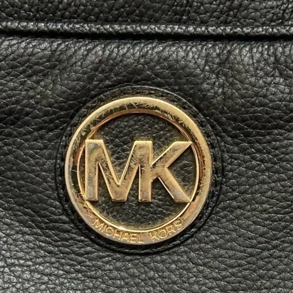 Michael Kors some wear